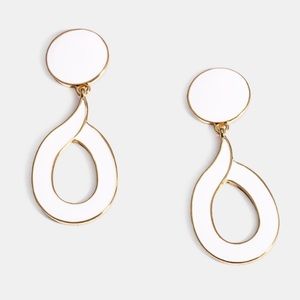 White dangly statement earrings